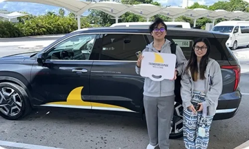 Happy customer at Cancun Airport sisters